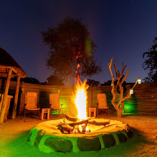 African boma fire tradition at the Safari Lodge - immerse yourself in the cultural atmosphere of South Africa.