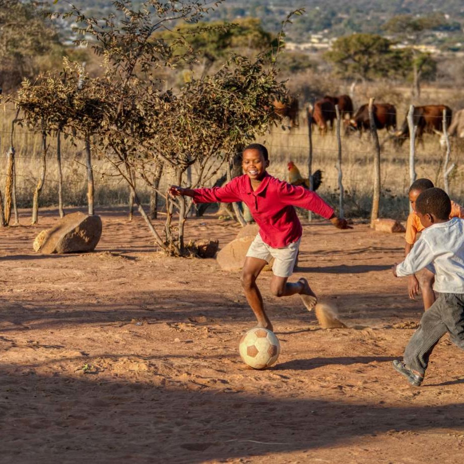 South Africa disadvantaged children play soccer