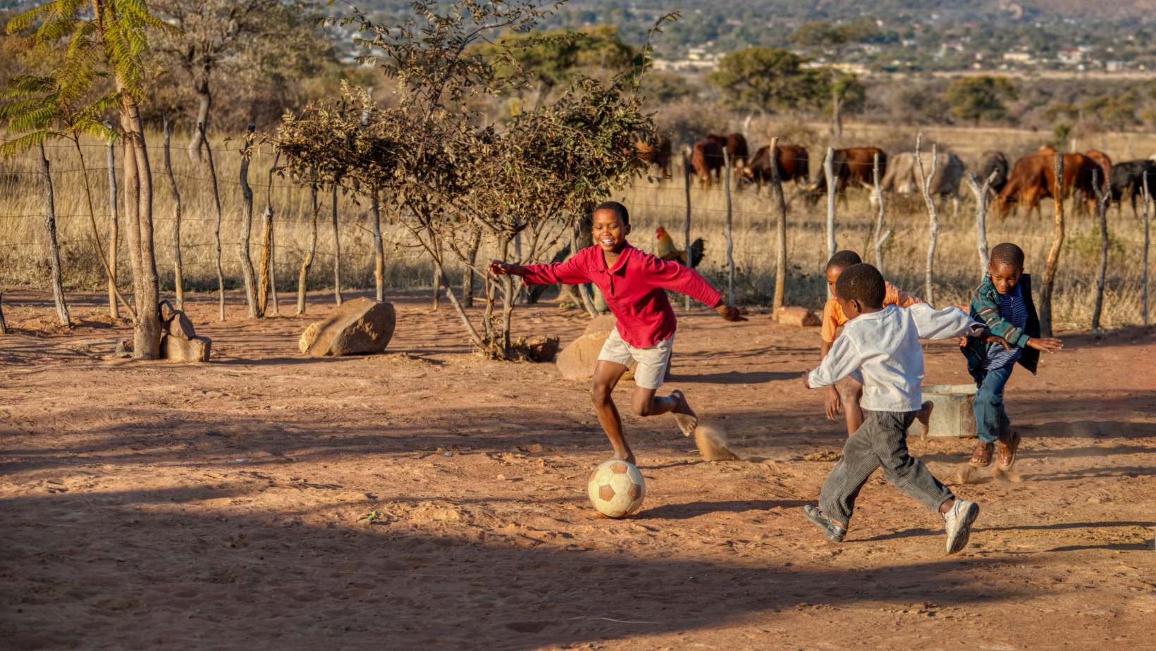 South Africa disadvantaged children play soccer